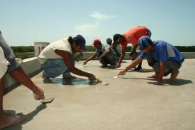 Construction workers at Cerros Sands, Belize – Best Places In The World To Retire – International Living